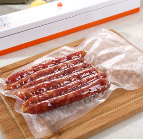 Meal prepper using sealer for portioned chicken breasts