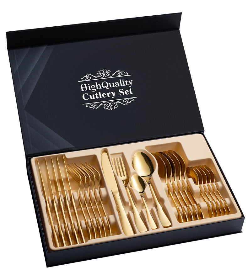 Formal table setting with steak dinner using cutlery set