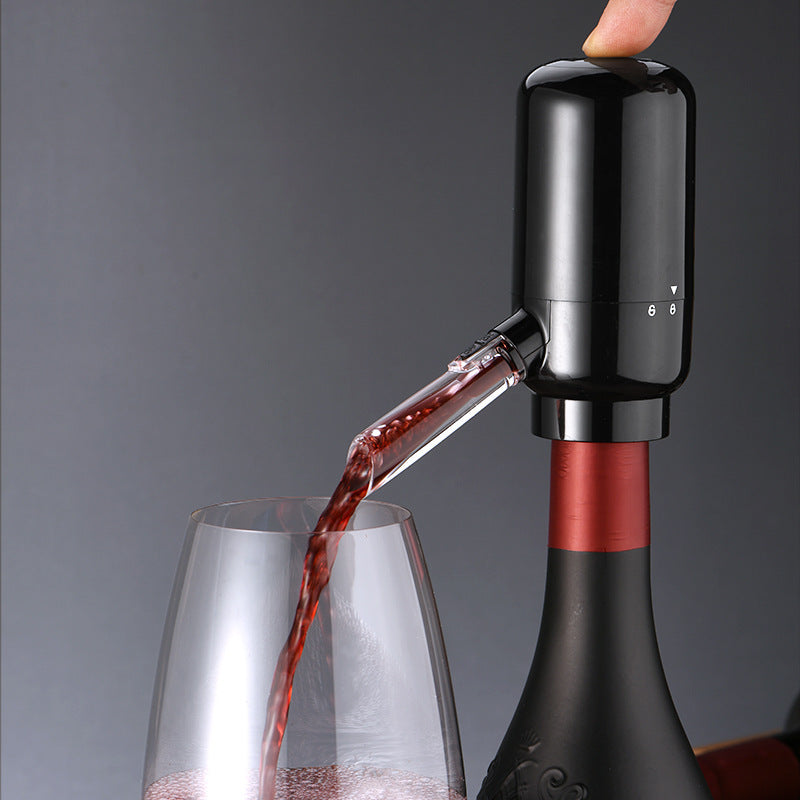 Black electric wine dispenser with 6 bottles on marble counter
